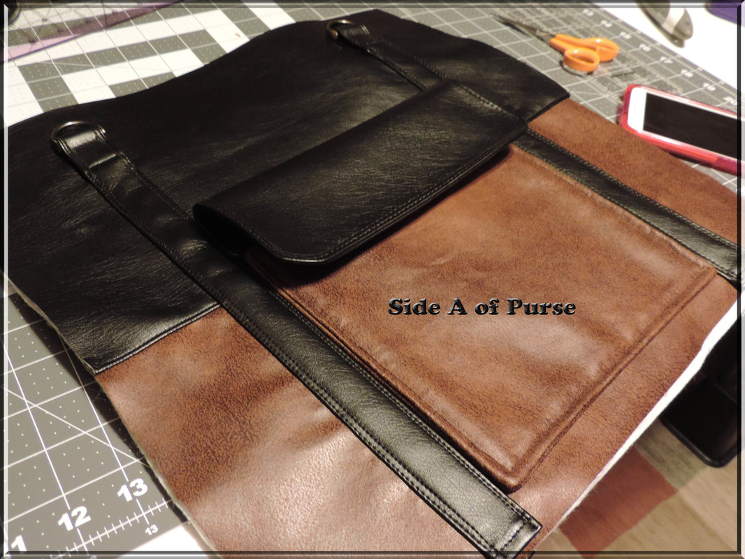 black and brown vinyl purse